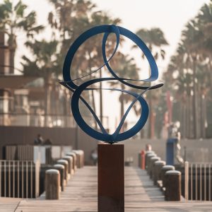 Rotatable geometric stainless steel dynamic sculpture