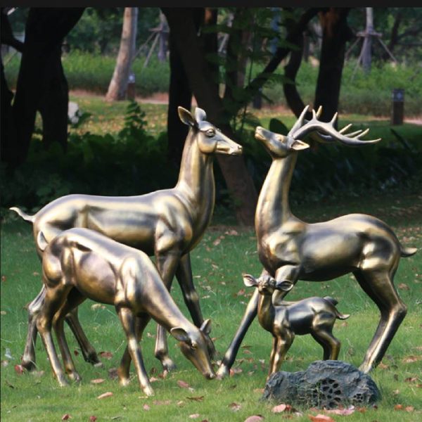 Bronze deer statue on the lawn beside the park - Image 2