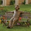 Outdoor park recliner Einstein full body bronze statue