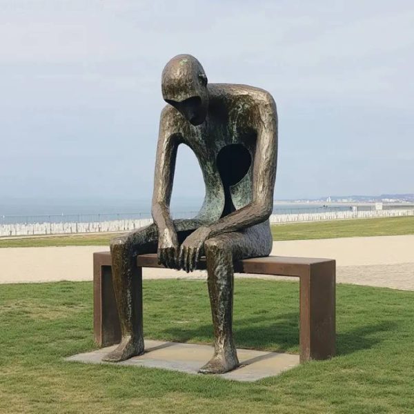 park outdoor grass hesitation man sitting bench bronze statue - Image 5