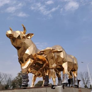 Golden geometric bronze bull sculpture