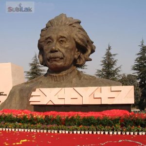 Large bronze statue of Einstein's head in the park outdoor square