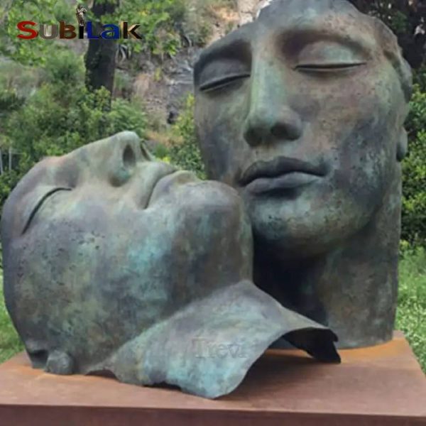 Large bronze incomplete human face sculpture in outdoor park square - Image 2