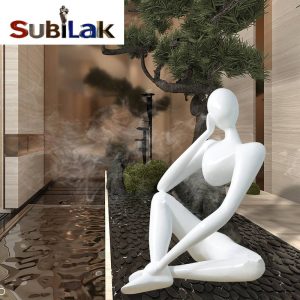 Interior white abstract fiberglass figurine