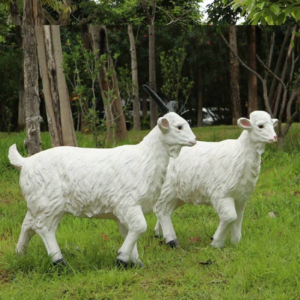 A fiberglass reinforced plastic goat sculpture in an outdoor park - Image 3