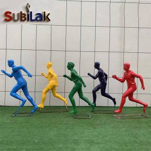 A fiberglass reinforced plastic sports figure statue in an outdoor park sports venue