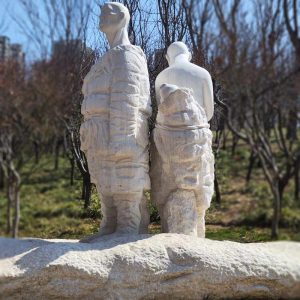 Enlightenment: A man, a woman and their baby, living a hard life