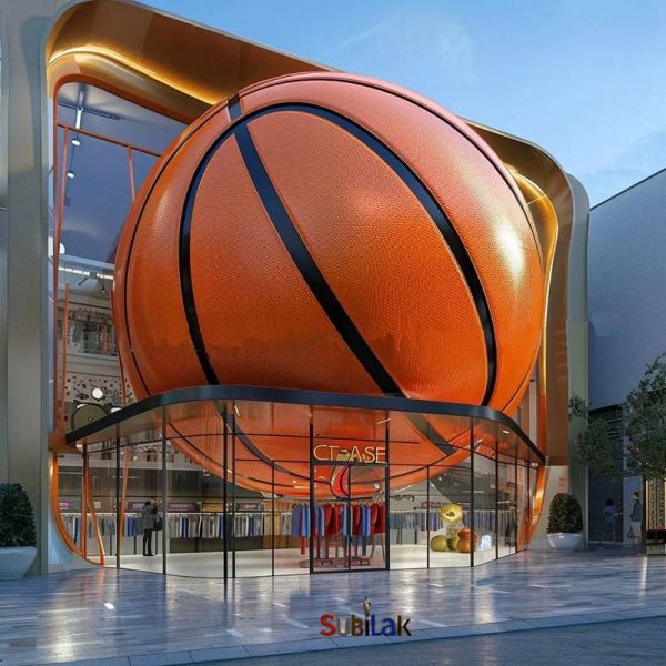 Giant fiberglass basketball sculpture in outdoor park square