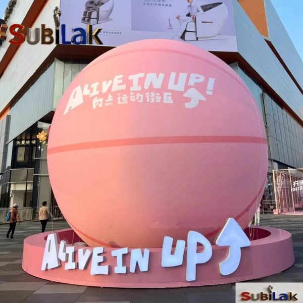 Giant fiberglass basketball sculpture in outdoor park square - Image 4