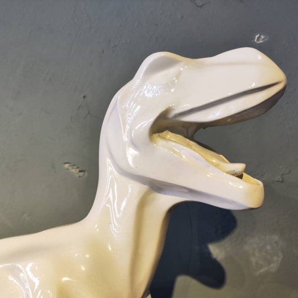 Dinosaur sculptures can be customized fiberglass sculptures
