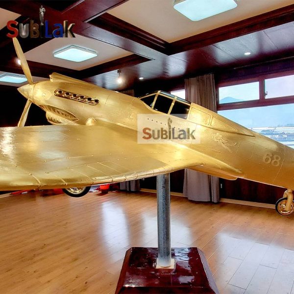 Gold fiberglass P-40 fighter model sculpture - Image 2