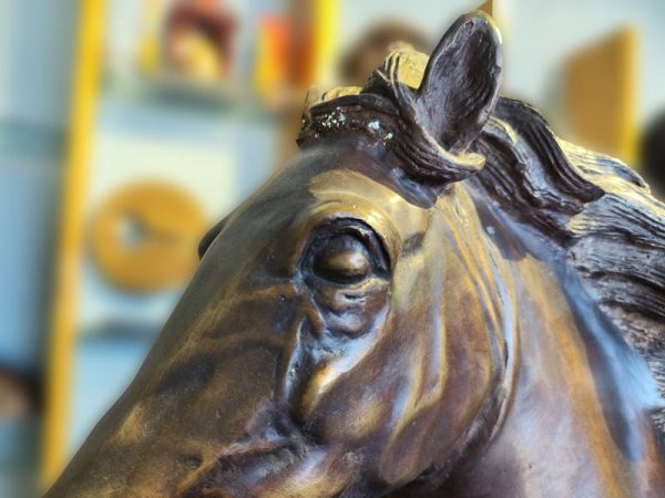 Large bronze horse statue: lifelike animal sculpture