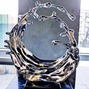 Mirror stainless steel water drop ring sculpture contains flow and vitality