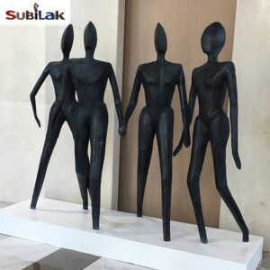 Indoor black abstract figure sculpture made of fiberglass
