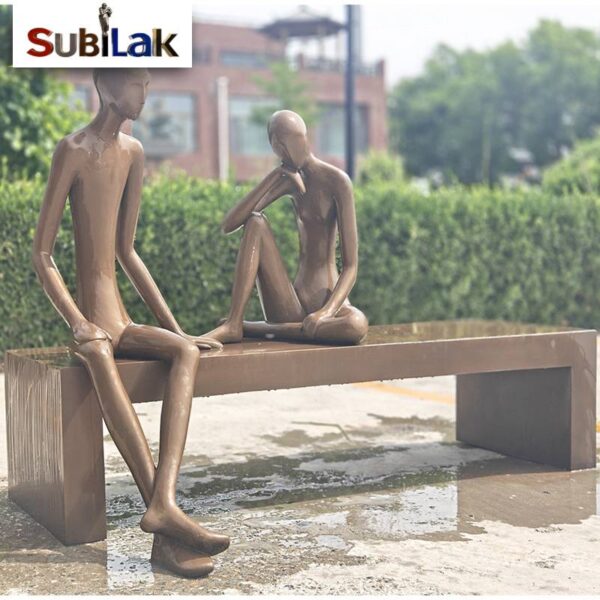 Bronze abstract figure sculpture in outdoor park public place