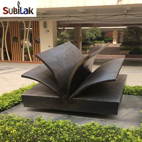Outdoor campus large bronze book sculpture