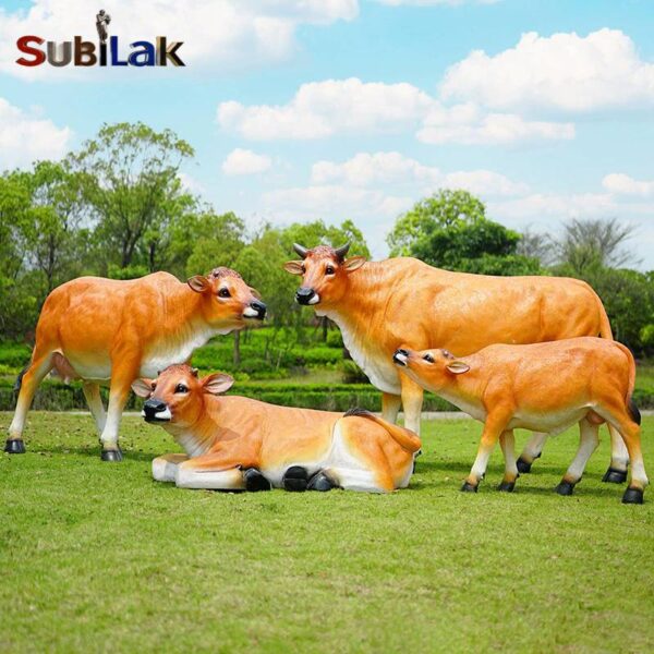 Outdoor park grass fiberglass cow sculpture