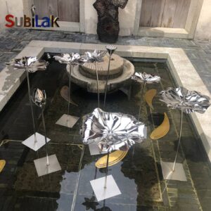 Lotus art installation in stainless steel in outdoor courtyard