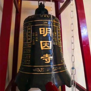 Bronze bell sculpture in the temple