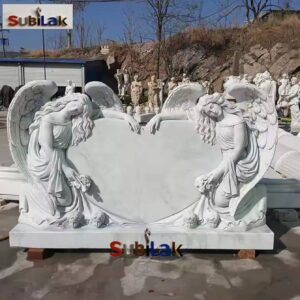 Single-heart tombstone sculpture made of white marble