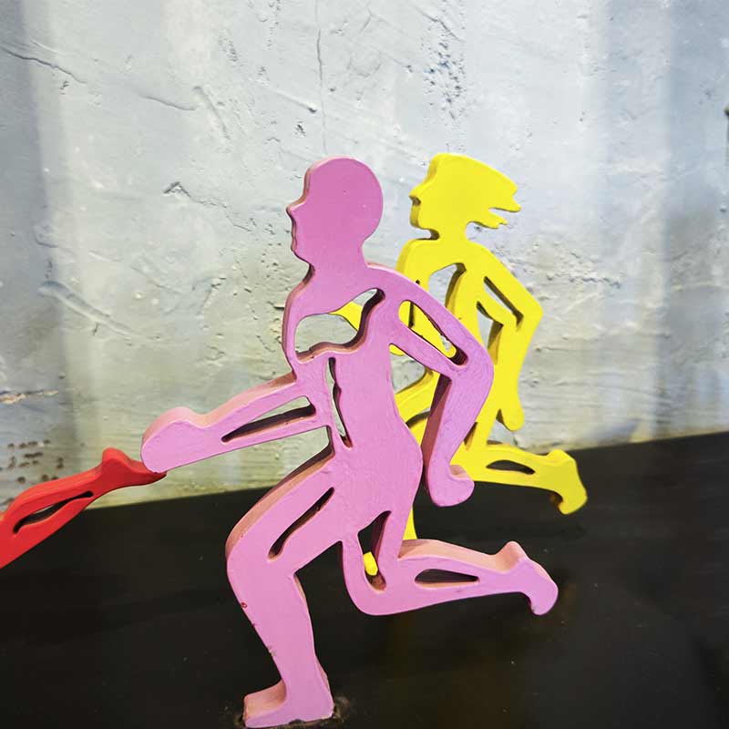 Dynamic Stainless Steel Running Sculpture: Vibrant Artwork Celebrating Motion & Teamwork